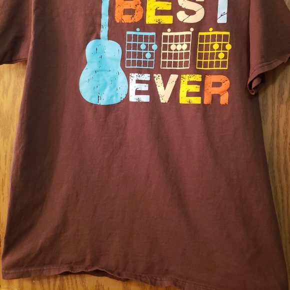 Men's brown t-shirt with "best dad ever" on the front with guitar. Never worn. - Picture 2 of 4